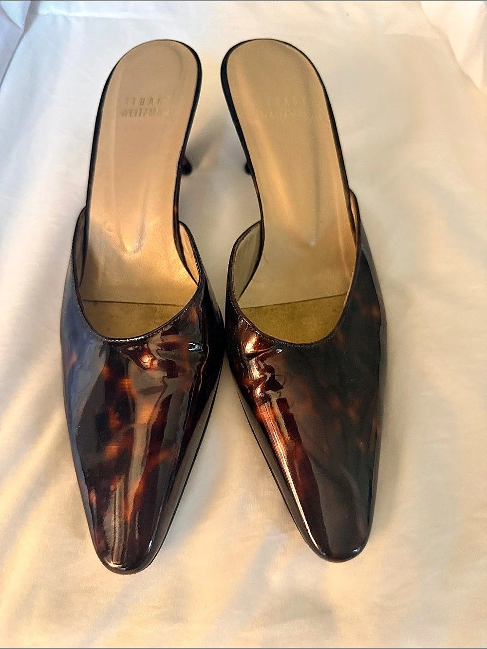 Stuart Weitzman tortoise shell heeled mules in Brown US 6